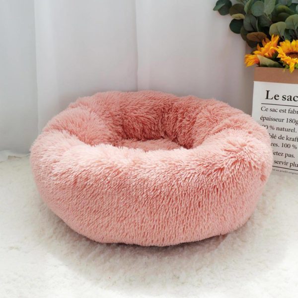 Plushy donut dog bed pink
